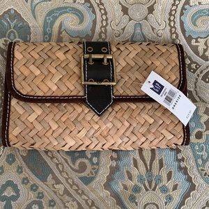 Straw clutch new 10 in across by 7 in